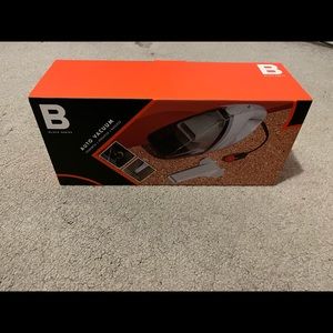 New in box auto vacuum